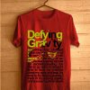 DEFYING GRAVITY RED SHIRT